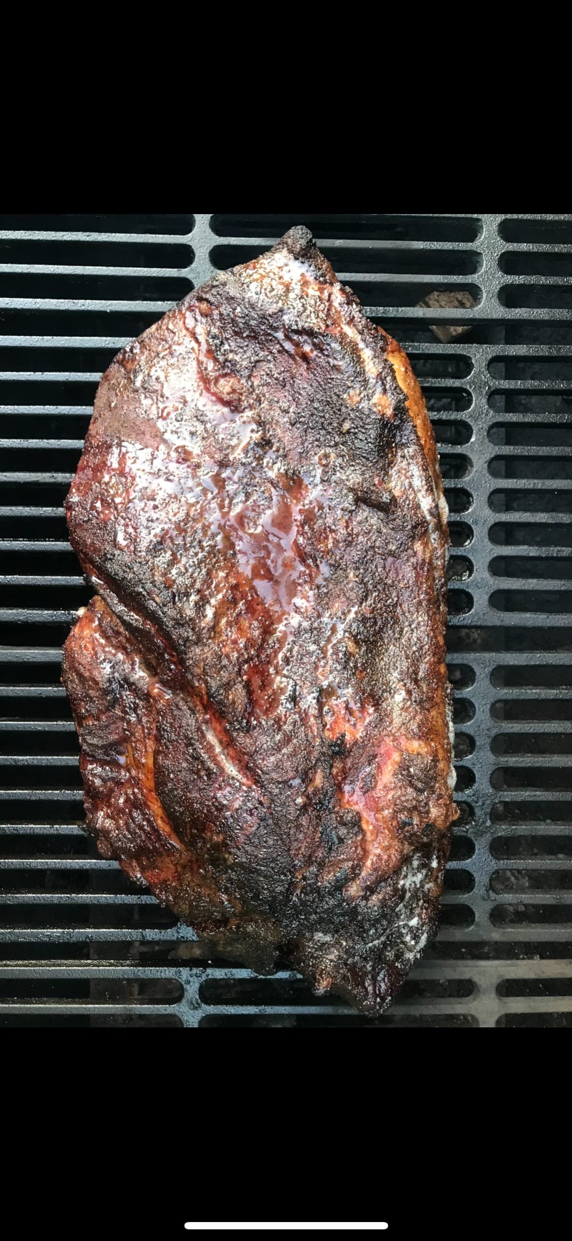 Whole brisket on the grill with beautiful bark