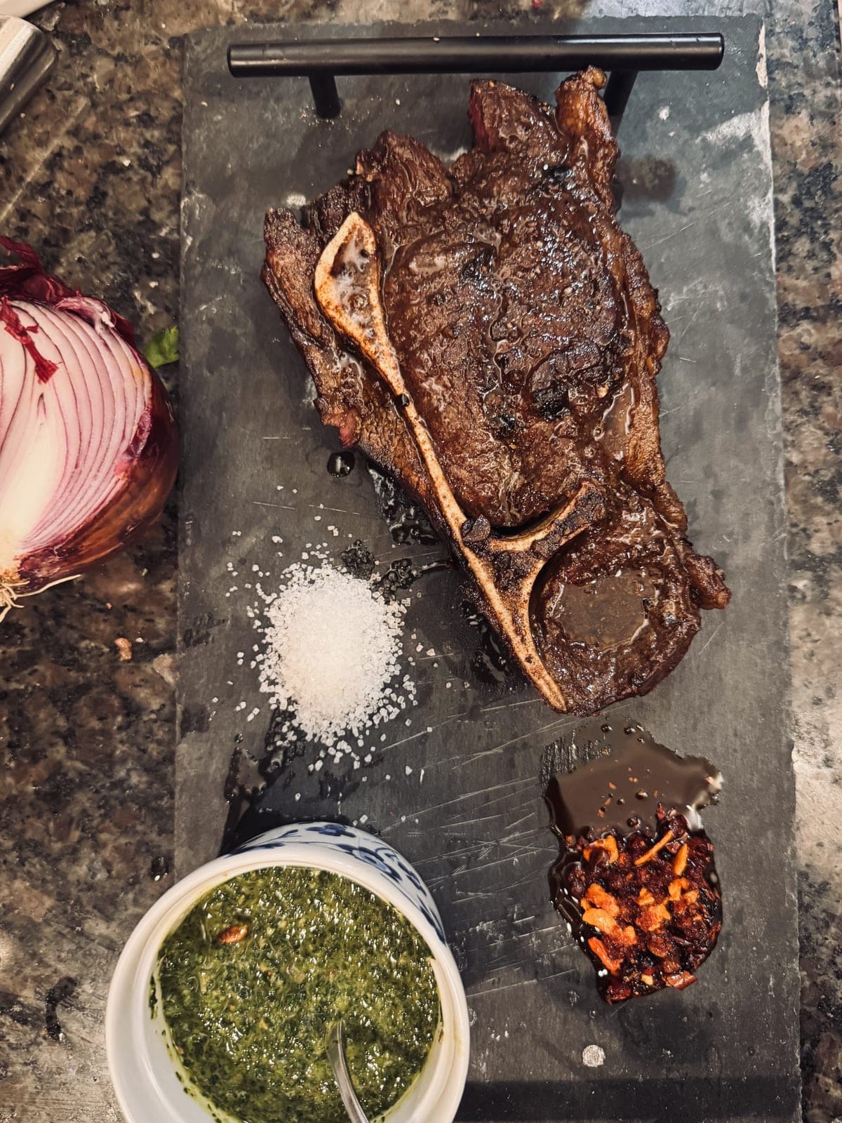 Tomahawk steak with chimichurri and sea salt