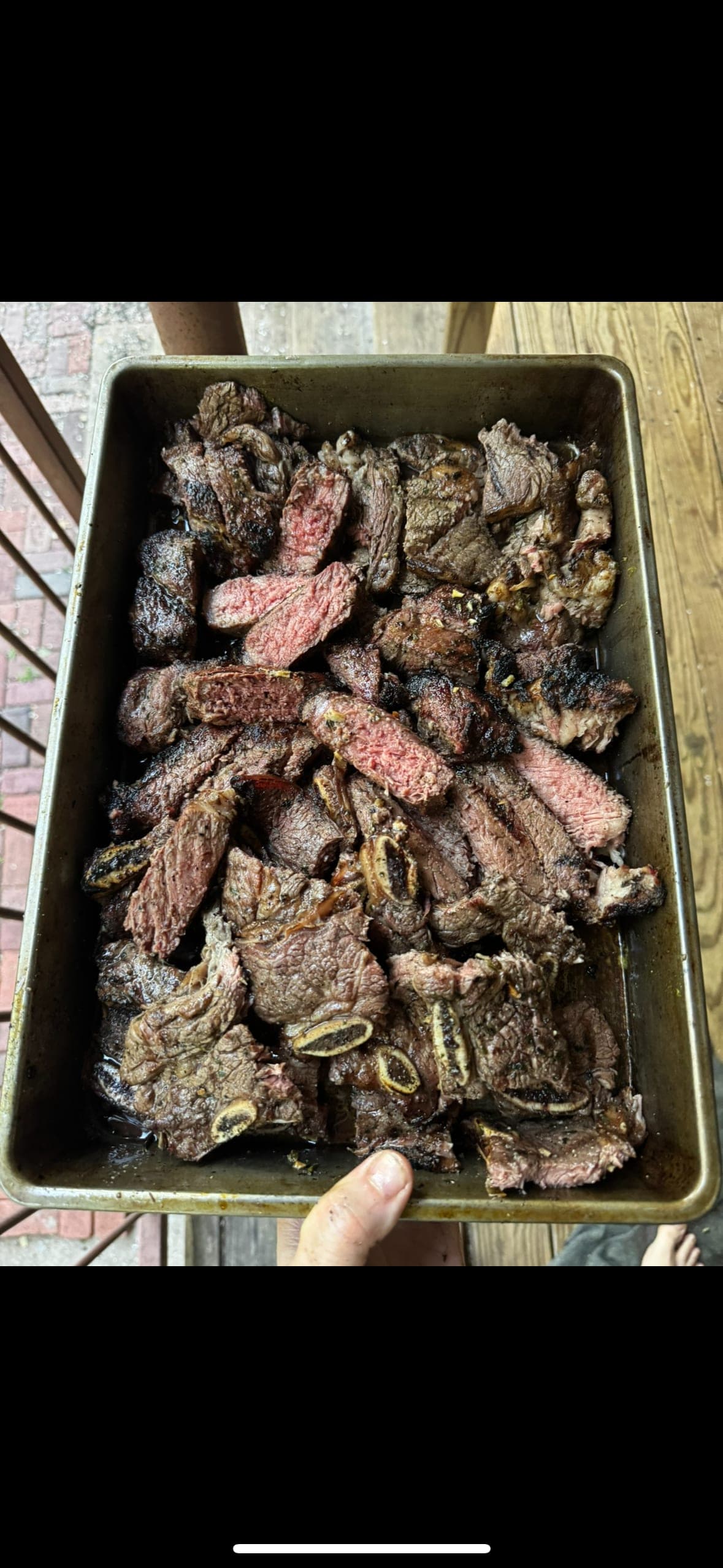Tray of hand-sliced smoked brisket